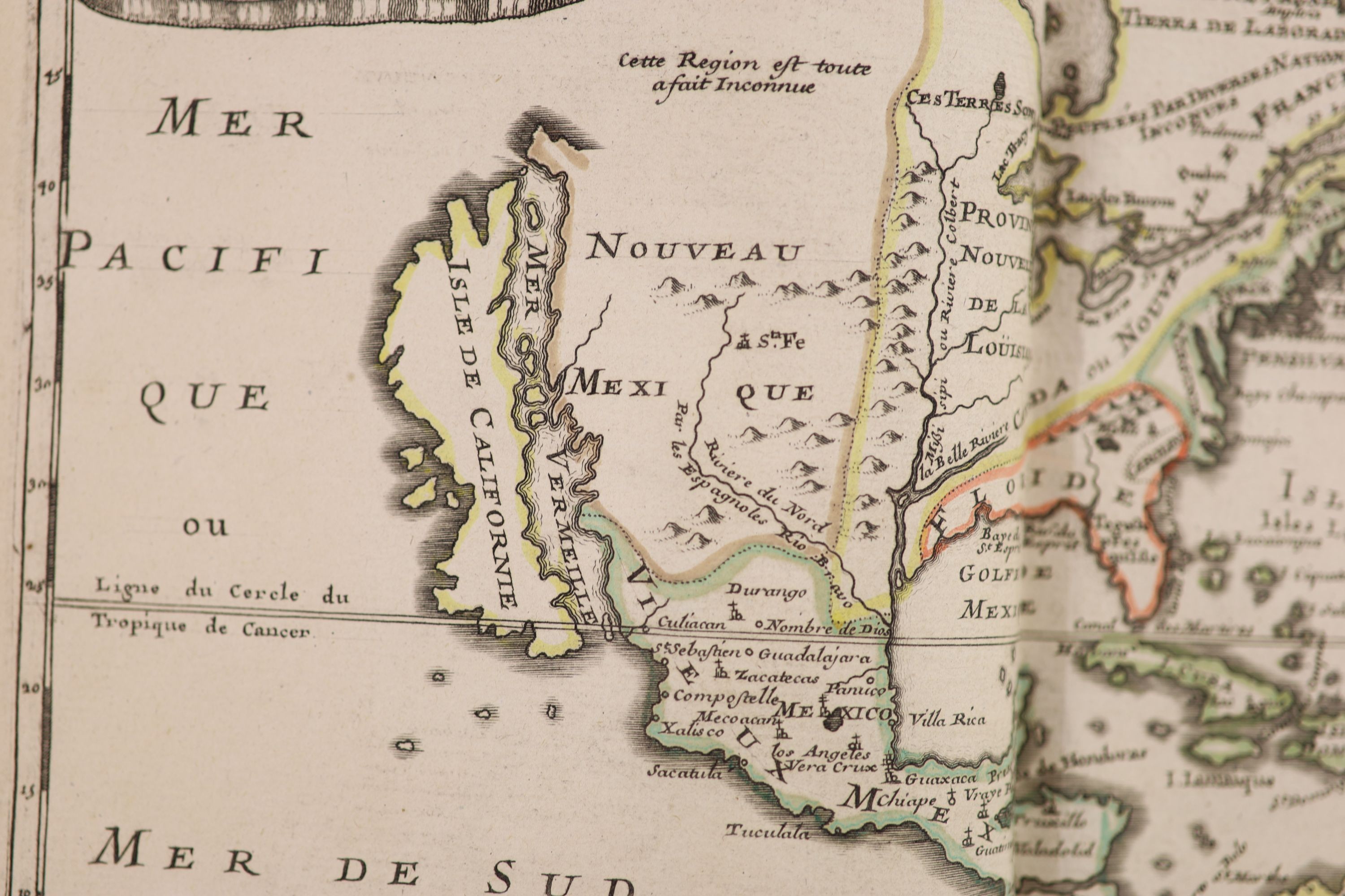 Fer, Nicholas de - Petit et Nouveau Atlas, 1st edition, oblong qto, original calf, title with armillary sphere and 19 double page mapsheets, all hand-coloured in outline, including North America, with California shown as